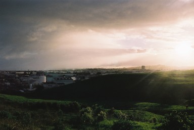 Bailey Naulls; In the Motion 2; Wide shot Auckland landscape drenched in sunshine